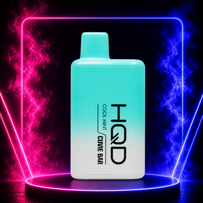 HQD Cuvie Bar Cool Mint 7000 Puffs disposable vape with refreshing mint flavor displayed on a neon smoke background for Pink Smoke Shop